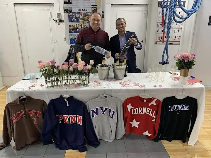 University sweatshirts from Penn, NYU, Cornell and Duke at the MFC college placement celebration