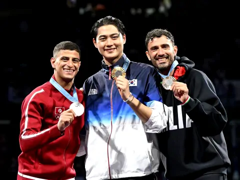 Fares Ferjani on the Paris 2024 men's saber podium